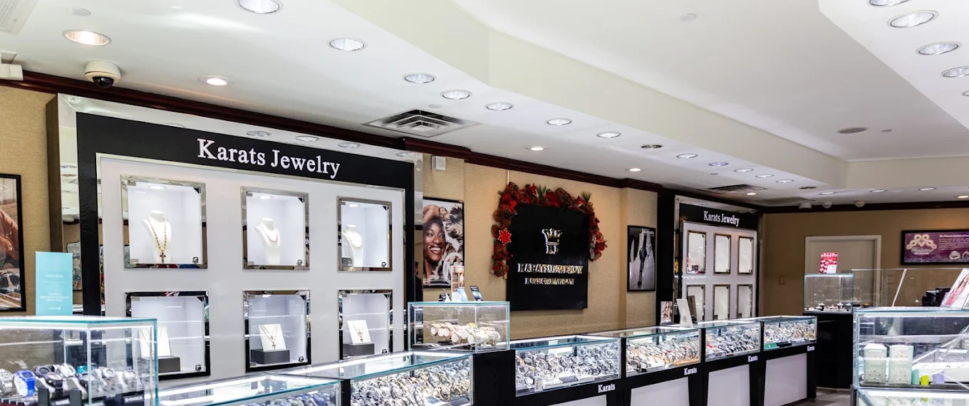 Inside the Karats Jewelry showroom: the display wall and glass counters