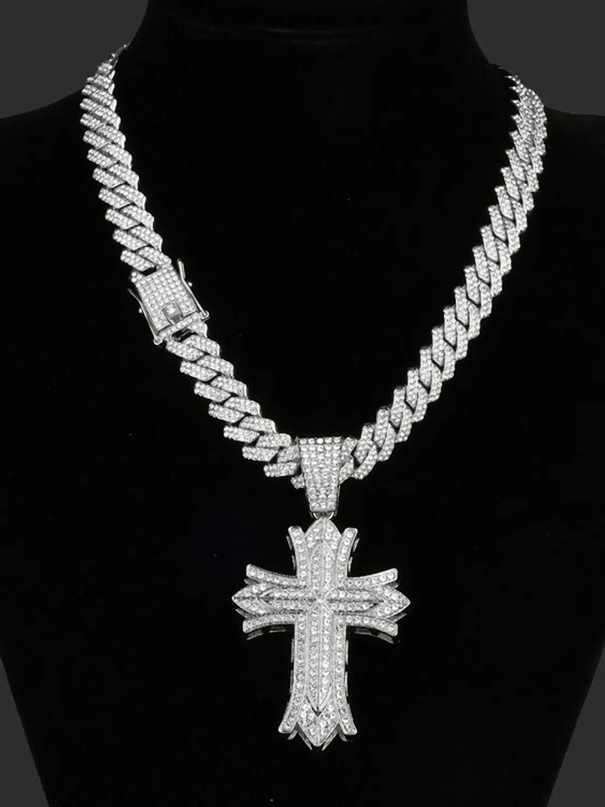 Iced-out Cuban link chain with a diamond cross pendant
