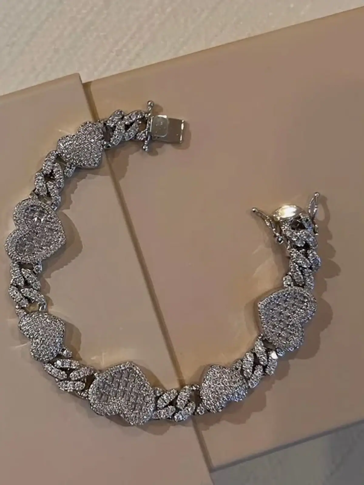 Pavé diamond heart and Cuban link bracelet